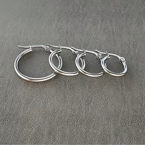 4 pair of Simple Hoop Earrings With Steel And Black For Men And Women. 4 sizes